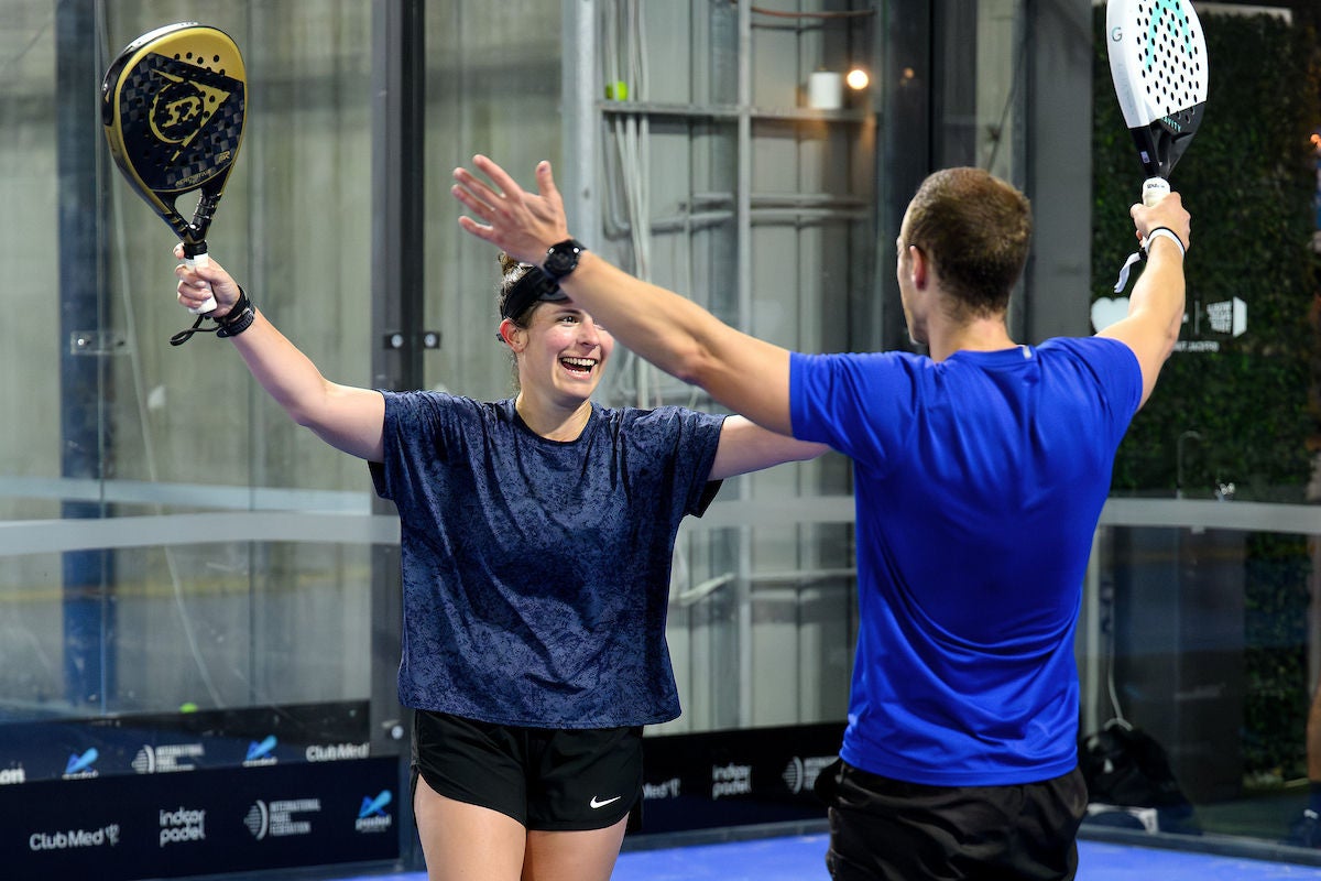An excited Doubles team playing Padel