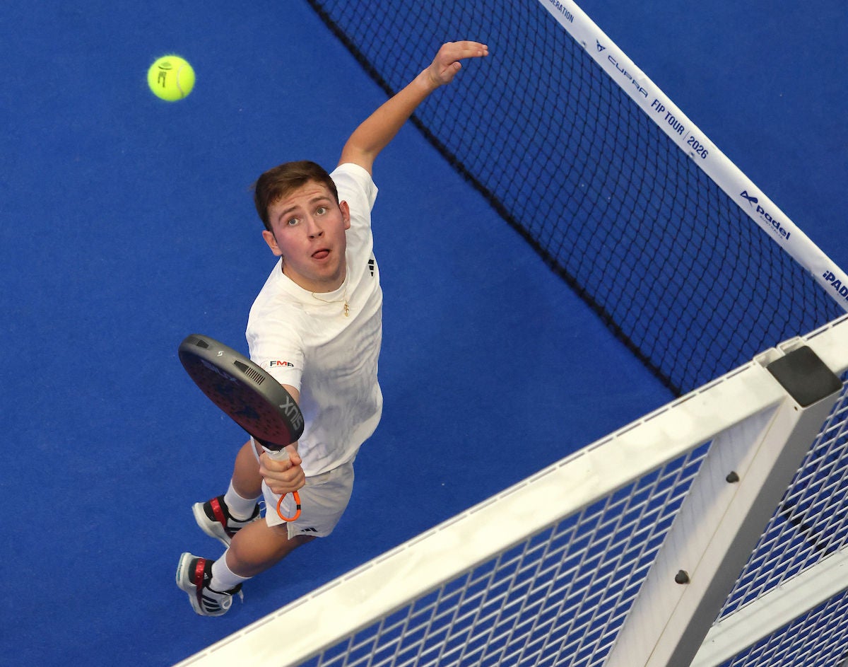 A overhead view of a player hitting a ball