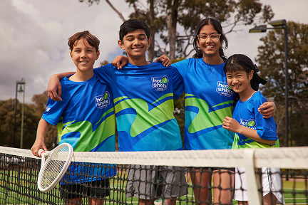 Hot Shot kids smiling at the net